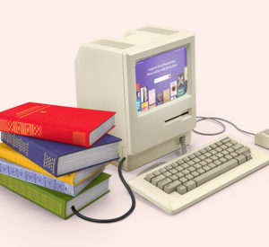 Desktop computer sitting next to a stack of books